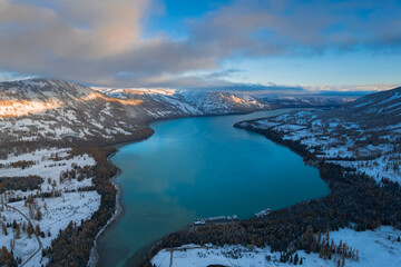 Aerial view of the winter landscape in Kanas lake, Xinjiang province, China. - obrazy, fototapety, plakaty