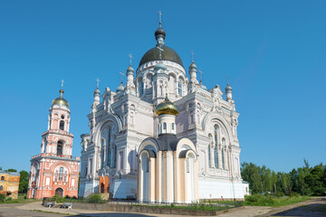 Fototapeta na wymiar Two temples of the ancient Kazan monastery on a July afternoon. Vyshny Volochek, Tver region. Russia