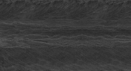 Abstract dark grey black slate background or texture.