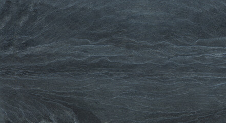 The texture of the stone wall. Close-up. Light gray rock backdrop.