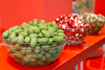 Natural Green Olives inside Glass Round Container