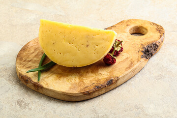 Hard cheese brick with walnut