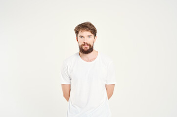 Obraz premium handsome bearded man in white t-shirt fashion studio
