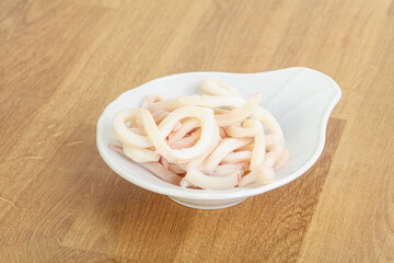 Marinated squid strips in the bowl