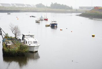 Old boats derelict on River Leven in Dumbarton