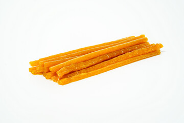 Close up of chewing snack sticks isolated on white background.