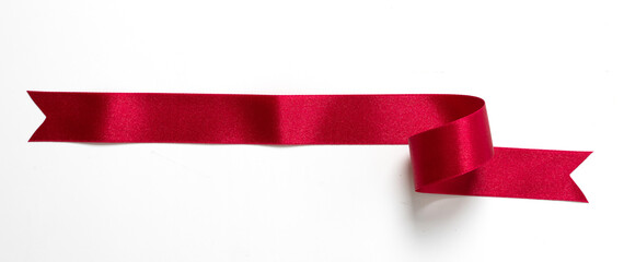 A roll red ribbon isolated on white