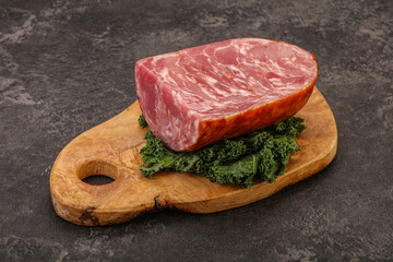 Beef ham piece over board