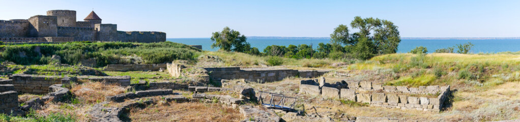 Fototapeta na wymiar The ruins of Antique Tyra, against the background of the Akkerman Fortress. Bilhorod-Dnistrovskyi fortress, Ukraine.