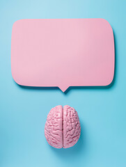 Human brain with pink empty bubble speech on vibrant blue background. Creative emotion expression...