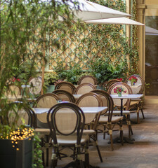 elegant outdoor summer tea room with flowers decorations