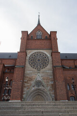 Fototapeta na wymiar Front view of Uppsala Cathedral, Scandinavian largest church in Sweden.