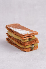 Mille-feuille dessert with caramel, vanilla and pumpkin cream