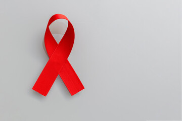 red ribbon of the AIDS prevention campaign, kidney cancer, head and neck cancer, hepatitis. Ribbon...