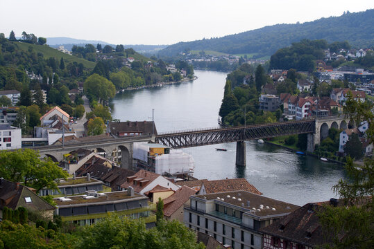 Aerial view of the old town with river Rhine from medieval fortress at the old town of Schaffhausen named Munot on a cloudy autumn day. Photo taken September 25th, 2021, Schaffhausen, Switzerland.