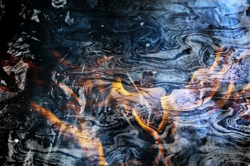 background oil spill burning fire, pollution ecology toxic fire gasoline