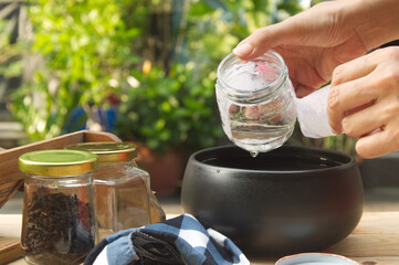after soak glass jars in boiling water,  leave it's cool until you can handle, easily peel label...