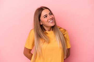 Fototapeta premium Young Russian woman isolated on pink background smiling and raising thumb up
