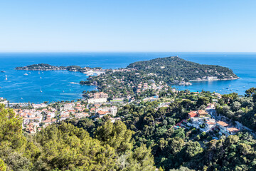 Fototapeta premium Aerial view of Saint-Jean-Cap-Ferrat with the blue sea and beautiful beaches