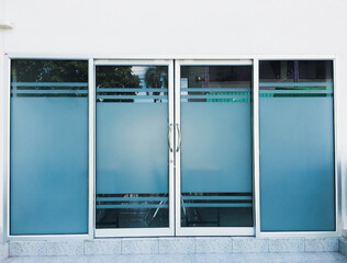 Glassdoors of the meeting room in the secondary school.