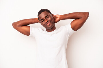 Young African American man isolated on white background feeling confident, with hands behind the head.