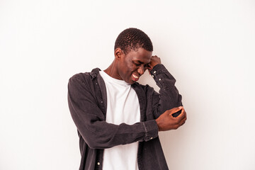 Young African American man isolated on white background massaging elbow, suffering after a bad movement.