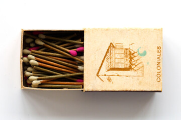 Old Cuban bamboo matches on a white background close up