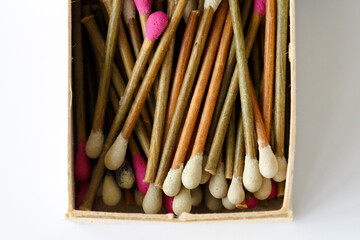 Old Cuban bamboo matches on a white background close up