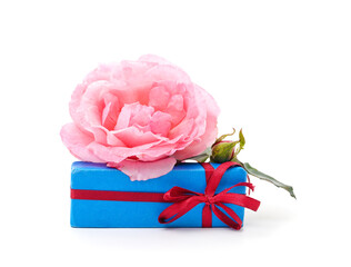 Beautiful pink roses with a gift.