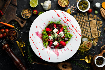 Vegetable salad with beets and feta cheese. Healthy food. Top view. Rustic style.