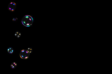 Soap bubbles isolated on a black background.