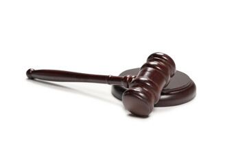 Wooden judge gavel and soundboard isolated on a white background.