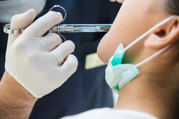 Woman receiving a dental treatment