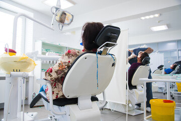 Woman receiving a dental treatment