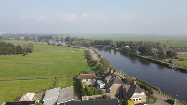 Aerial view of Amstelveen Oudekerk ad Amstel typical dutch landscape and historic village along the Amstel river in The Netherlands.