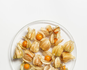 Physalis berries or golden berry in transparent plate Physalis fruit food