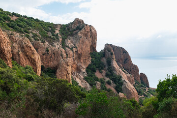 Fototapeta na wymiar Beautiful Panoramic Views on the mountains from the top of Cap Esterel. Hiking Adventures. Rocky Mountains. Provence, South of France.