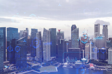 Technology hologram over panorama city view of Singapore. The largest tech hub in Asia. The concept...