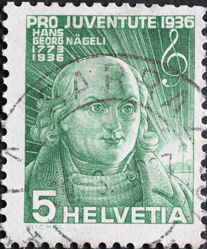 Switzerland - Circa 1936: a postage stamp printed in the Switzerland showing a historical portrait of the singer H.G. Nägeli.