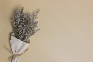 A bunch of dried lavender on the table with copy space.