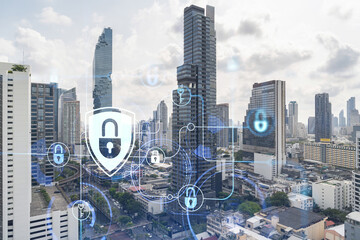 Padlock icon hologram over panorama city view of Bangkok to protect business in Southeast Asia. The...