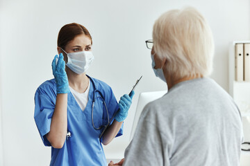 nurse and patient Hospital visit medical masks