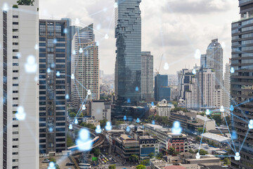 Obraz premium Social media icons hologram over panorama city view of Bangkok, Southeast Asia. The concept of people networking, connections and career opportunities. Double exposure.