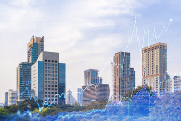 Financial stock chart hologram over panorama city view of Bangkok, business center in Southeast Asia. The concept of international transactions. Double exposure.