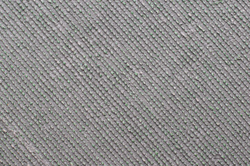 Fototapeta na wymiar Textured rubber mat surface with seams 