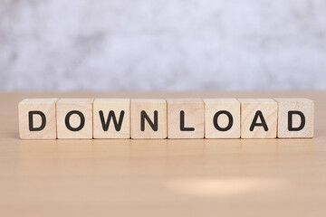 Wooden cube with text download . Financial markets. Finance.