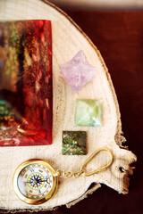 Altar detail with electromagnetic wave protection pyramid, two small jade pyramids and a compass