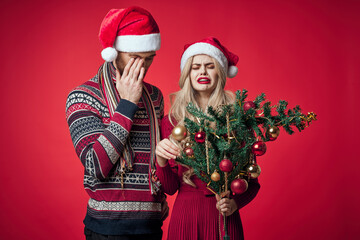 man and woman in new year clothes holiday decoration romance