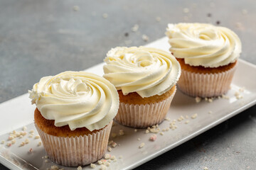 Tasty cupcakes close-up, shallow depth of field. Holiday cake celebration, delicious dessert