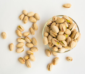 roasted pistachios on white background
